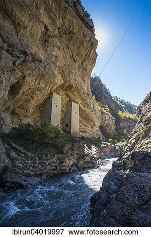 "Chechen watchtowers under overhanging cliff on the Argun river, near Itum Kale, Chechnya, Caucasus, Russia, Europe" View Large Photo Image Stock Photo - "Chechen watchtowers under overhanging cliff on the Argun river, near Itum Kale, Chechnya, Caucasus, Russia, Europe". Fotosearch