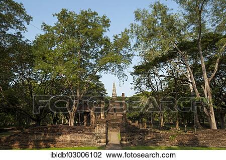 Stock Image - "Chedi, old wall of the temple complex of Wat Nang Phaya, Si Satchanalai Historical Park, UNESCO World Heritage Site, Si Satchanalai, Sukhothai Province, Northern Thailand, Thailand, Asia". Fotosearch