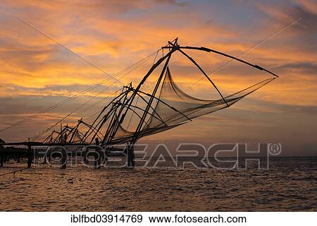 Stock Photo - "Cheena vala or Chinese fishing nets in the evening, Fort Kochi, Kochi, Kerala, India, Asia". Fotosearch