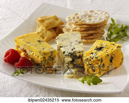 "Cheese and biscuits with Stilton, White Stilton and Blacksticks cheese. " View Large Photo Image Stock Photography - "Cheese and biscuits with Stilton, White Stilton and Blacksticks cheese. ". Fotosearch