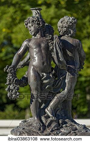 "Cherub statues at the fountain basin in the water parterre, Herrenchiemsee Palace, Herrenchiemsee, Chiemsee, Chiemgau, Upper Bavaria, Bavaria, Germany, Europe" View Large Photo Image Stock Photo - "Cherub statues at the fountain basin in the water parterre, Herrenchiemsee Palace, Herrenchiemsee, Chiemsee, Chiemgau, Upper Bavaria, Bavaria, Germany, Europe". Fotosearch