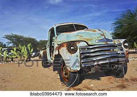 "Chevrolet car wreck with energy saving bulbs, Solitaire, historically Areb, since 1848 a small private settlement on the same named farm, Namib-Naukluft National Park, Namibia, Africa" View Large Photo Image Stock Image - "Chevrolet car wreck with energy saving bulbs, Solitaire, historically Areb, since 1848 a small private settlement on the same named farm, Namib-Naukluft National Park, Namibia, Africa". Fotosearch