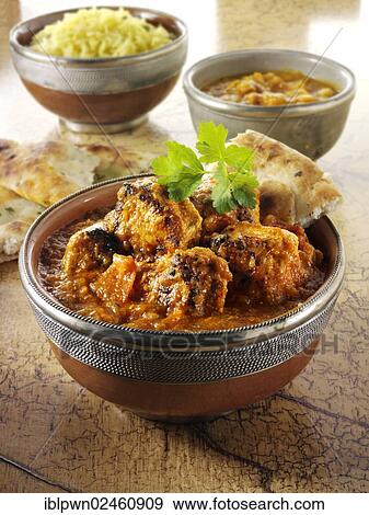 Stock Photo - "Chicken Dopiaza curry and rice, Indian cuisine". Fotosearch