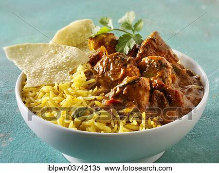 "Chicken Jalfrezi, pilau rice and papadum, traditional Indian curry" View Large Photo Image Stock Photography - "Chicken Jalfrezi, pilau rice and papadum, traditional Indian curry". Fotosearch