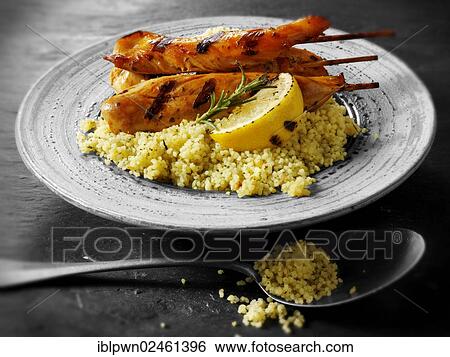 Chicken Kebab and couscous View Large Photo Image Stock Photograph - Chicken Kebab and couscous. Fotosearch