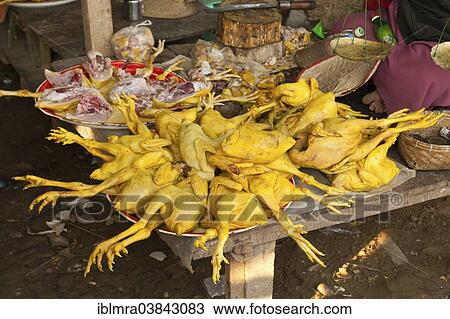 Stock Image - "Chicken, poultry meat display at a market, Yangon, Myanmar, Asia". Fotosearch