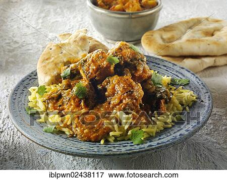 Stock Photo - "Chicken Sag Masala curry and rice, Indian food". Fotosearch