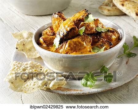 Chicken Tikka Masala with Pilau rice and naan bread Indian food View Large Photo Image Stock Photography - Chicken Tikka Masala with Pilau rice and naan bread Indian food. Fotosearch