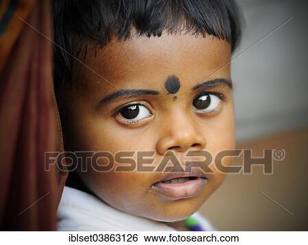 Stock Photograph - "Child at a Hindu temple festival, Thrissur, Kerala, South India, India, Asia". Fotosearch
