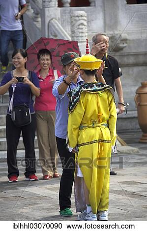 "Child being dressed to be photographed, Himmelspalast, Beijing, China, People's Republic of China, Asia" View Large Photo Image Stock Image - "Child being dressed to be photographed, Himmelspalast, Beijing, China, People's Republic of China, Asia". Fotosearch