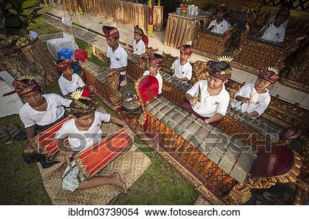 "Children and teenagers of a gamelan orchestra at an event, Ubud, Bali, Indonesia, Asia" View Large Photo Image Picture - "Children and teenagers of a gamelan orchestra at an event, Ubud, Bali, Indonesia, Asia". Fotosearch