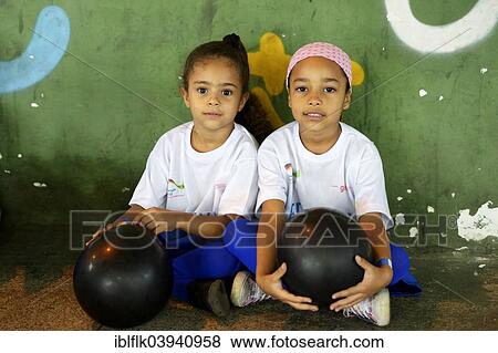 "Children at a sporting event, slum, Morro dos Prazeres favela, Rio de Janeiro, Brazil, South America" View Large Photo Image Stock Photo - "Children at a sporting event, slum, Morro dos Prazeres favela, Rio de Janeiro, Brazil, South America". Fotosearch