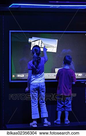 Picture - "Children controlling software by touch and gestures, touch screen, Ideenpark 2012, technology and education summit conference, Essen, Ruhr area, North Rhine-Westphalia, Germany, Europe". Fotosearch