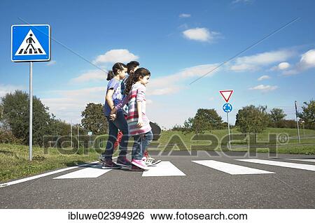 Children crossing a zebra crossing View Large Photo Image Stock Photograph - Children crossing a zebra crossing. Fotosearch