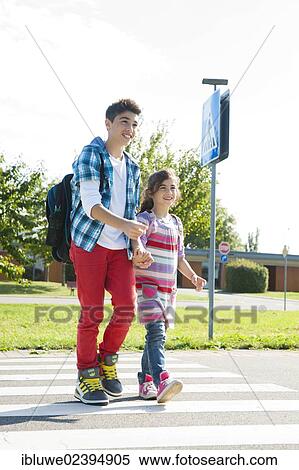 Children crossing a zebra crossing View Large Photo Image Stock Photography - Children crossing a zebra crossing. Fotosearch