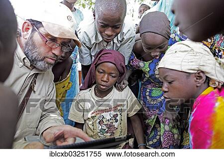 "Children during Koran lessons with a notebook, Garoua, North Region, Cameroon, Africa" View Large Photo Image Stock Photography - "Children during Koran lessons with a notebook, Garoua, North Region, Cameroon, Africa". Fotosearch