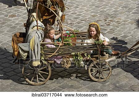 "Children in an impoverished cart, wedding procession of the """"Landshut Wedding"""", historic center, Landshut, Lower Bavaria, Bavaria, Germany, Europe" View Large Photo Image Picture - "Children in an impoverished cart, wedding procession of the """"Landshut Wedding"""", historic center, Landshut, Lower Bavaria, Bavaria, Germany, Europe". Fotosearch