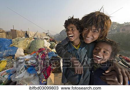 "Children live, play and work on the garbage dump at Bhagmati River in the middle of the city, Kathmandu, Kathmandu District, Bagmati Zone, Nepal, Asia" View Large Photo Image Stock Image - "Children live, play and work on the garbage dump at Bhagmati River in the middle of the city, Kathmandu, Kathmandu District, Bagmati Zone, Nepal, Asia". Fotosearch
