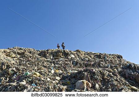 "Children live, play and work on the garbage dump at Aletar garbage dump, Aletar, Kathmandu District, Bagmati Zone, Nepal, Asia" View Large Photo Image Stock Photography - "Children live, play and work on the garbage dump at Aletar garbage dump, Aletar, Kathmandu District, Bagmati Zone, Nepal, Asia". Fotosearch