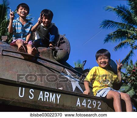 "Children making a victory sign on a M48 tank from the U. S. Army, Hue, Provinz Thua Thien-Hue, Vietnam, Asia" View Large Photo Image Stock Image - "Children making a victory sign on a M48 tank from the U. S. Army, Hue, Provinz Thua Thien-Hue, Vietnam, Asia". Fotosearch