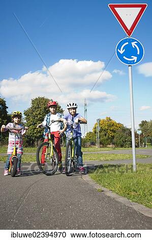 Children on bicycles at a traffic awareness course View Large Photo Image Stock Image - Children on bicycles at a traffic awareness course. Fotosearch