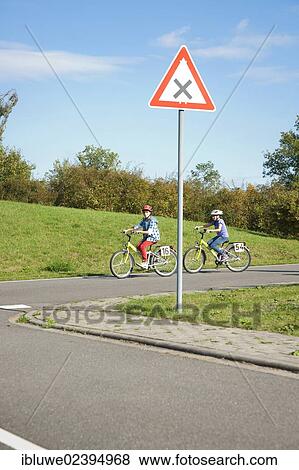 Children on bicycles at a traffic awareness course View Large Photo Image Stock Photo - Children on bicycles at a traffic awareness course. Fotosearch