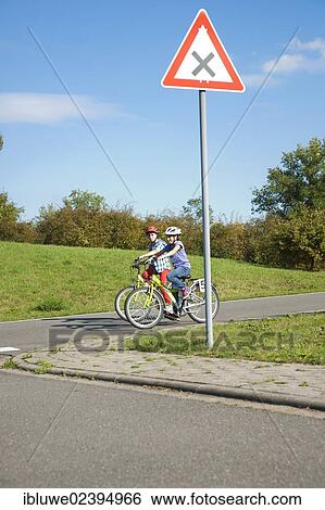 Children on bicycles at a traffic awareness course View Large Photo Image Stock Photograph - Children on bicycles at a traffic awareness course. Fotosearch