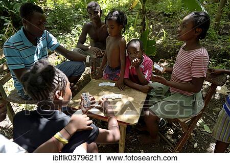 "Children playing dominoes, Tchawa, Leogane, Haiti, North America" View Large Photo Image Stock Image - "Children playing dominoes, Tchawa, Leogane, Haiti, North America". Fotosearch
