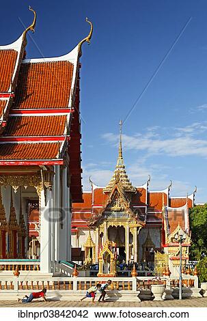 "Children playing in front of Wat Chalong temple, Phuket, Thailand, Asia" View Large Photo Image Stock Image - "Children playing in front of Wat Chalong temple, Phuket, Thailand, Asia". Fotosearch