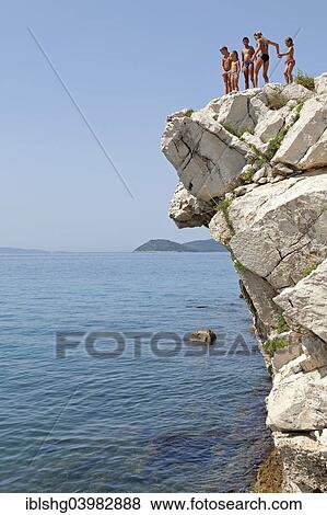 "Children standing on cliff, Split, Dalmatia, Croatia, Europe" View Large Photo Image Stock Photo - "Children standing on cliff, Split, Dalmatia, Croatia, Europe". Fotosearch