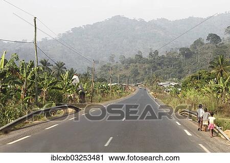 "Children walking along the main road, near Dschang, West Region, Cameroon, Africa" View Large Photo Image Stock Image - "Children walking along the main road, near Dschang, West Region, Cameroon, Africa". Fotosearch