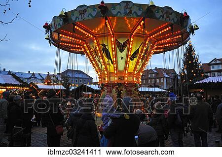 "Children's carousel at the Christmas market on Schlossplatz square, with visitors at the front at dusk, Erlangen, Middle Franconia, Bavaria, Germany, Europe" View Large Photo Image Stock Image - "Children's carousel at the Christmas market on Schlossplatz square, with visitors at the front at dusk, Erlangen, Middle Franconia, Bavaria, Germany, Europe". Fotosearch