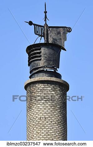 "Chimney of a former brewery from 1907 against a blue sky, Brand, Middle Franconia, Bavaria, Germany, Europe" View Large Photo Image Stock Photo - "Chimney of a former brewery from 1907 against a blue sky, Brand, Middle Franconia, Bavaria, Germany, Europe". Fotosearch