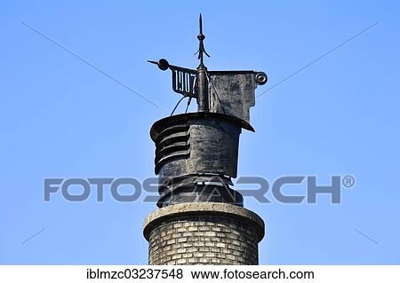 "Chimney of a former brewery from 1907 against a blue sky, Brand, Middle Franconia, Bavaria, Germany, Europe" View Large Photo Image Stock Photo - "Chimney of a former brewery from 1907 against a blue sky, Brand, Middle Franconia, Bavaria, Germany, Europe". Fotosearch