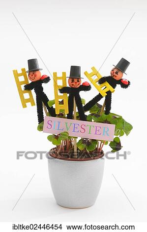 Chimneysweep figurines as lucky charms for the new year View Large Photo Image Picture - Chimneysweep figurines as lucky charms for the new year. Fotosearch