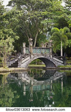 "Chinese bridge in the Water Palace of Tirtagangga, Tirtagangga, Bali, Indonesia, Asia" View Large Photo Image Stock Image - "Chinese bridge in the Water Palace of Tirtagangga, Tirtagangga, Bali, Indonesia, Asia". Fotosearch