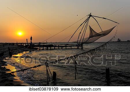 Stock Photo - "Chinese fishing nets at sunset, Kochi, Kerala, South India, India, Asia". Fotosearch