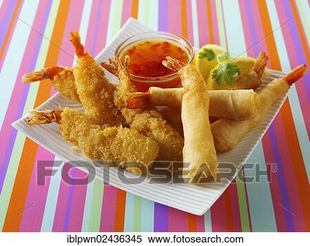 "Chinese starters, deep fried breaded prawns, spring rolls, dim sum, and samosas" View Large Photo Image Stock Photography - "Chinese starters, deep fried breaded prawns, spring rolls, dim sum, and samosas". Fotosearch
