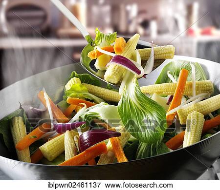 Chinese stir fry vegetables in a wok View Large Photo Image Stock Photo - Chinese stir fry vegetables in a wok. Fotosearch