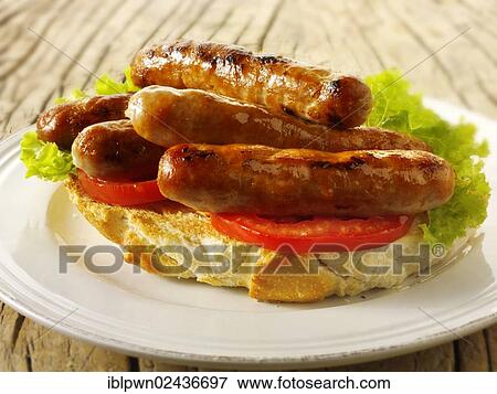 Chipolata sausage sandwich View Large Photo Image Stock Photo - Chipolata sausage sandwich. Fotosearch