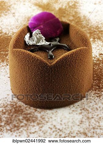 "Chocolate cake with a sponge case and chocolate filling, covered with cocoa powder" View Large Photo Image Stock Image - "Chocolate cake with a sponge case and chocolate filling, covered with cocoa powder". Fotosearch