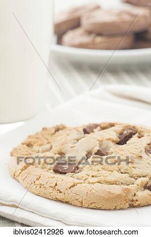 Chocolate chip cookies and a glass of milk View Large Photo Image Stock Photograph - Chocolate chip cookies and a glass of milk. Fotosearch
