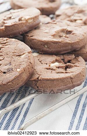 Chocolate chip cookies on cooling rack View Large Photo Image Stock Image - Chocolate chip cookies on cooling rack. Fotosearch