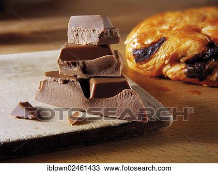 "Chocolate in front of Pain au chocolat, French pastry" View Large Photo Image Stock Image - "Chocolate in front of Pain au chocolat, French pastry". Fotosearch