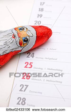 Chocolate Santa Claus on a German appointment calendar View Large Photo Image Stock Photograph - Chocolate Santa Claus on a German appointment calendar. Fotosearch