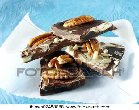 Chocolate swirl biscuits with nuts View Large Photo Image Stock Photo - Chocolate swirl biscuits with nuts. Fotosearch