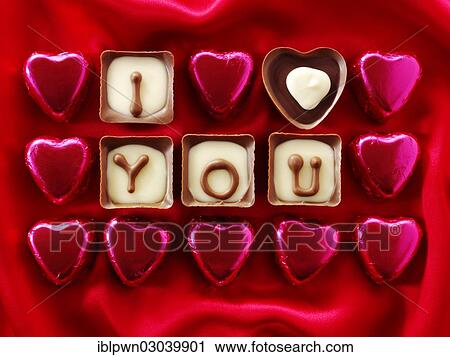 Stock Image - "Chocolates forming the words """"I love you""""". Fotosearch