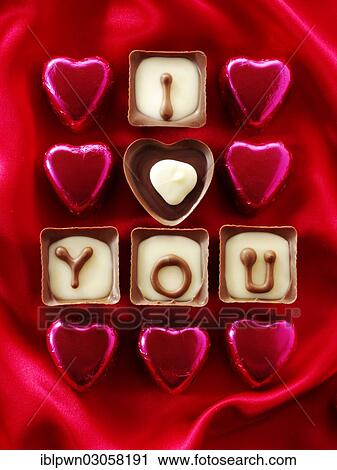 Stock Image - "Chocolates forming the words """"I love you""""". Fotosearch