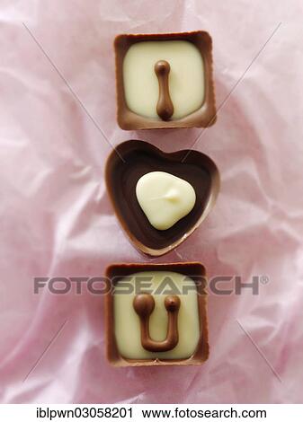 "Chocolates forming the words """"I love U""""" View Large Photo Image Stock Image - "Chocolates forming the words """"I love U""""". Fotosearch