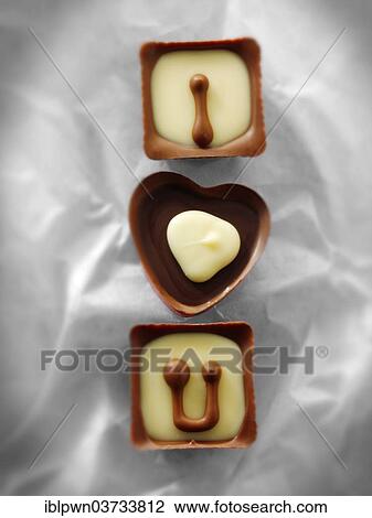"Chocolates forming the words """"I love U""""" View Large Photo Image Stock Image - "Chocolates forming the words """"I love U""""". Fotosearch